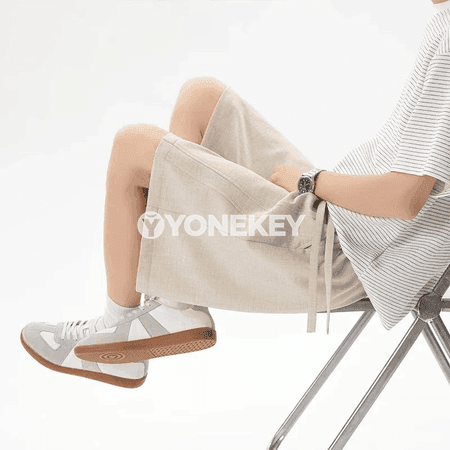Erkekler üçin ýeňil ýazki linen görnüşli giň bermuda şortikler