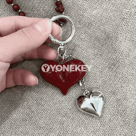 Ýürek we ýaý görnüşli bezegli döredijilikli açar halkasy