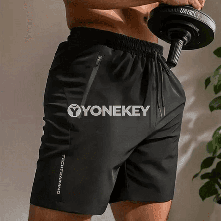 Erkekler üçin ýeňil, çalt gurýan sport şortikleri