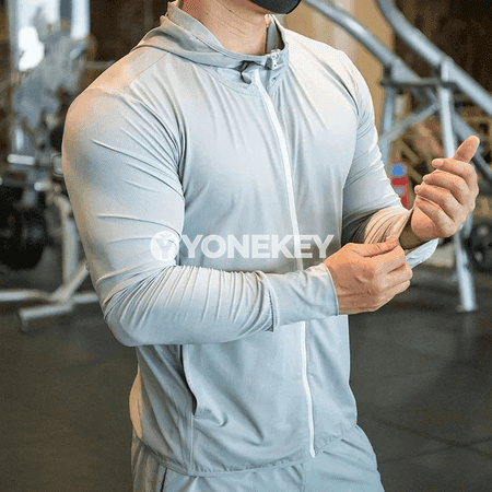 Erkekler üçin giň kesimli uzun ýeňli sport we fitnes köýnegi