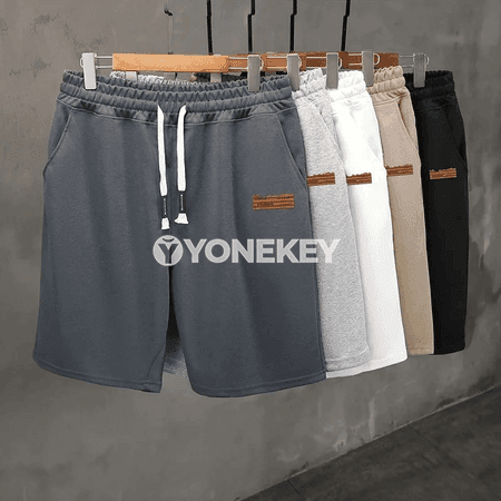 Erkekler üçin tomusky sport şortigi, elastik bilikli, giň biçimli