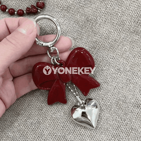 Ýürek we ýaý görnüşli bezegli döredijilikli açar halkasy