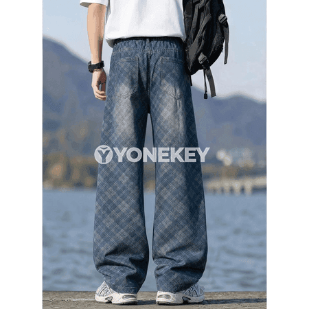 Erkekleriň giň kesimli ýokary belli baggy denim jalbarlary
