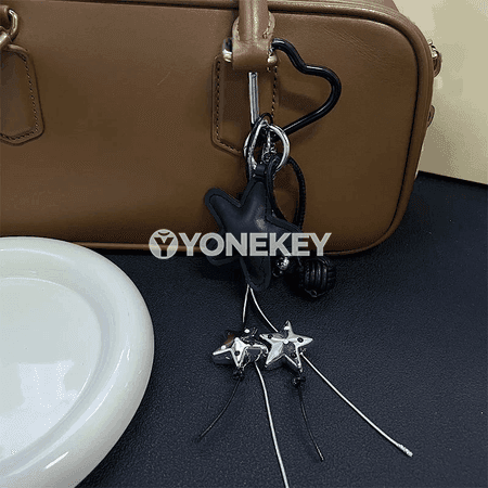 Zenanlar üçin ýyldyzly PU deri telefon gülgüsi we sumka bezegi
