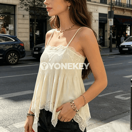 Zenanlar üçin ýeňsiz dantelli pliseli bluzka, tomusky top