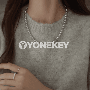 Zenanlar üçin owadan görnüşli merjen monjukly zynjyr.