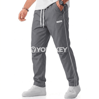 Erkekler üçin ýeňil ýöriş balaklary, çalt gurap, dem alýan sport modeli
