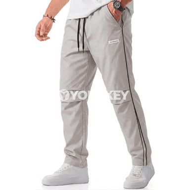 Erkekler üçin ýeňil ýöriş balaklary, çalt gurap, dem alýan sport modeli