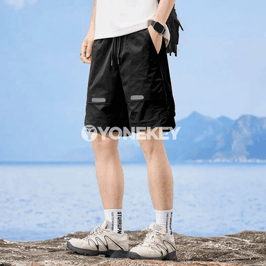 Erkekler üçin ýeňil, dem alýan ýaz‑tomus şortigi
