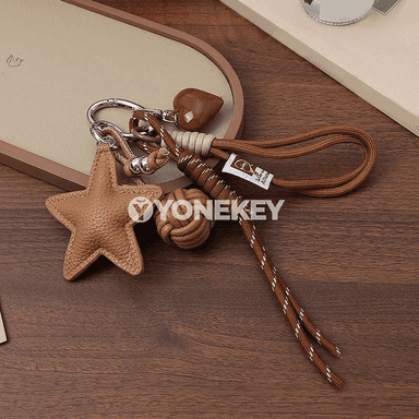Ýüplükli ýyldyz görnüşli sumka asgysy — deri stilindäki açar brelok