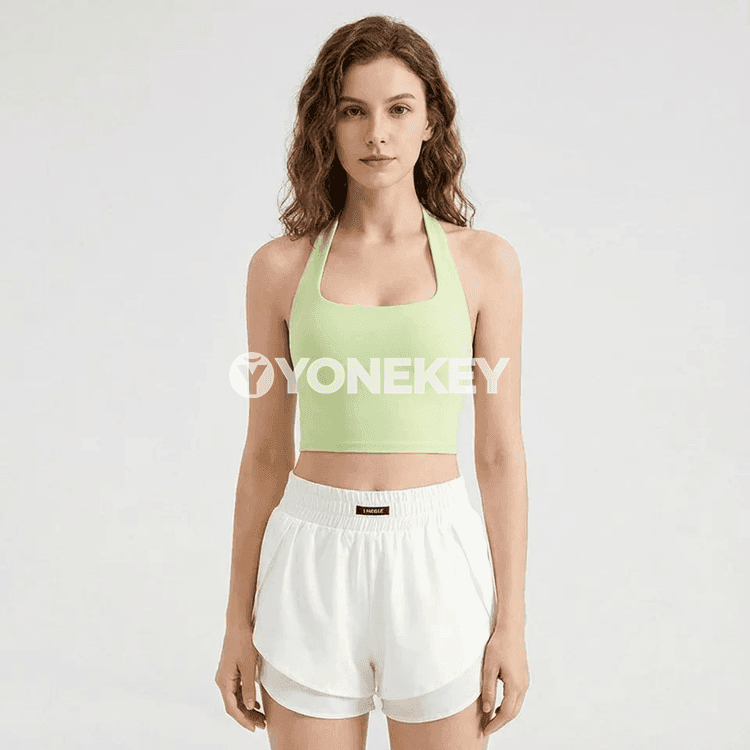 Zenanlar üçin sport bras: ýeňil, dem alyşly we arka açyk fitnes modeli