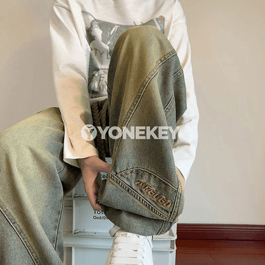 Erkekler üçin giň kesimli, nagyşly gündelik jeans balaklar