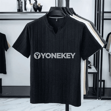 Erkekleriň ýaz üçin ýeňil, dem alýan uzyn däl ýeňli futbolkasy