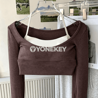 Aýallar üçin uzyn ýeňli yoga köýnekçe: rahat fitnes we pilates üst eşigi