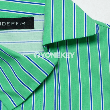 Aýal-gyzlar üçin ýaşyl zolakly dar ýeňsiz moda topy