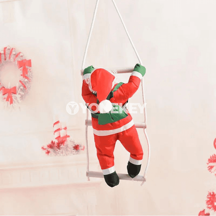 Täze ýyl bezegi — Santa Klaus assa dyrmaşýan ýüpli bezeg