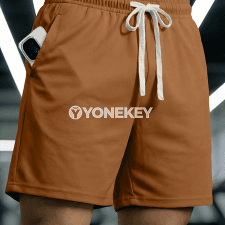 Erkekler üçin ýeňil sport şortigi — çalt guradyjy, dem alýan