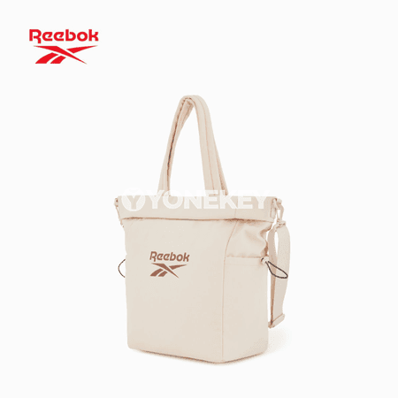 Gyzlar üçin niýetlenen giň we owadan Reebok sumka